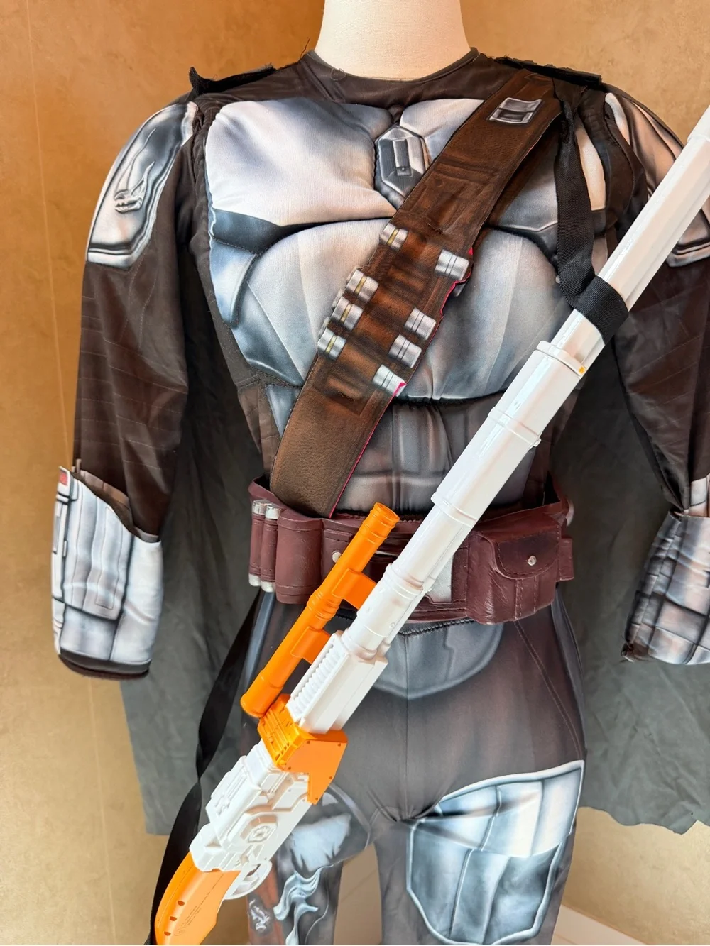 Star Wars Mandalorian Costume with Orange and White Toy Gaffi Pike